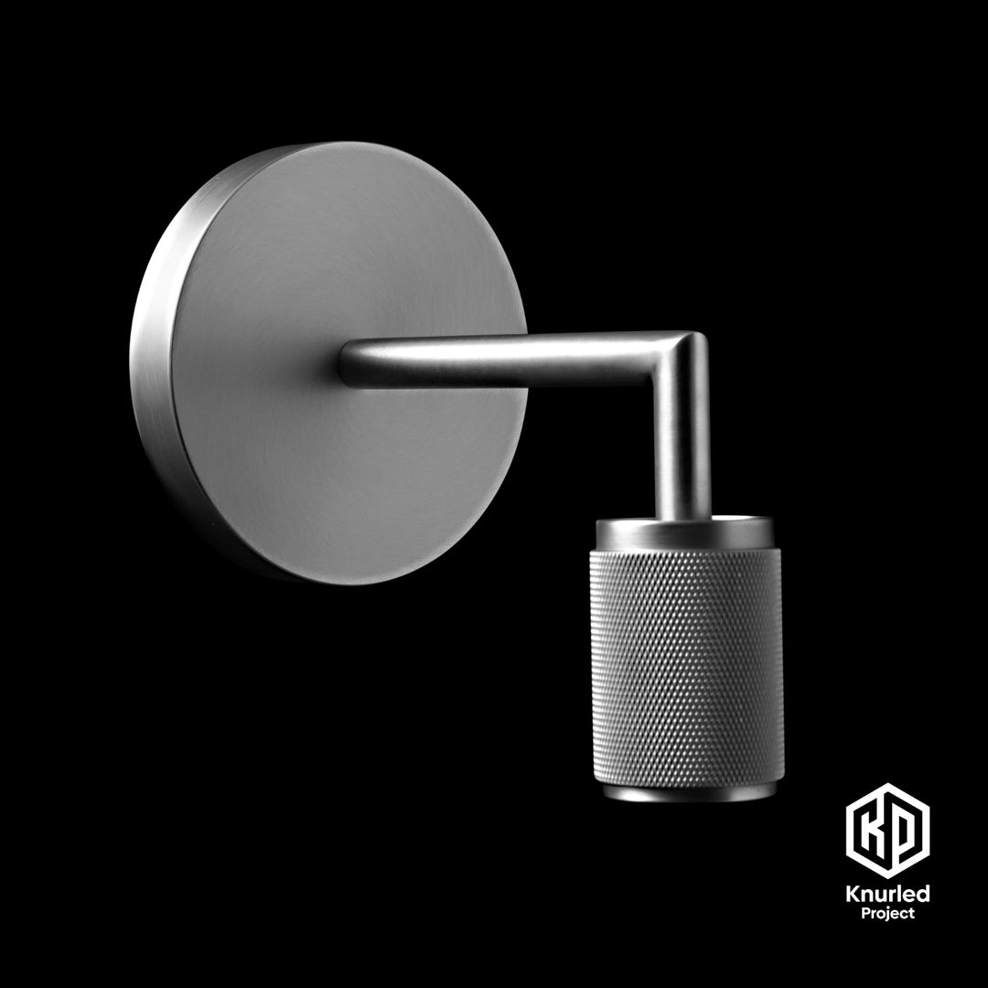steel wall light with diamond cut knurling